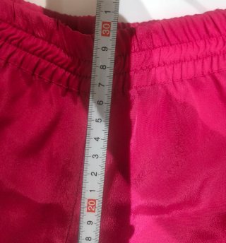 Pantalón corto rosa con cremalleras