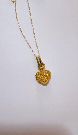Collana con ciondolo cuore sacro in oro 18kt 750