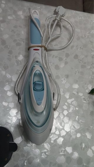Plancha de ropa portátil