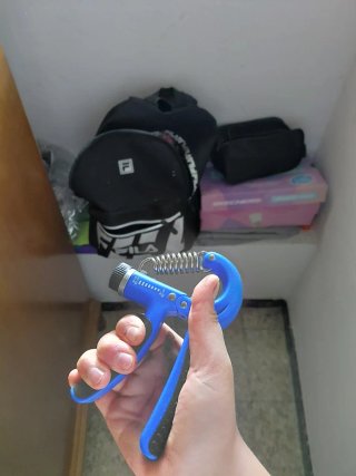 Entrenador de agarre azul