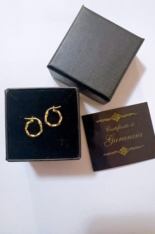 Orecchini a cerchio intrecciati in oro 18kt 750