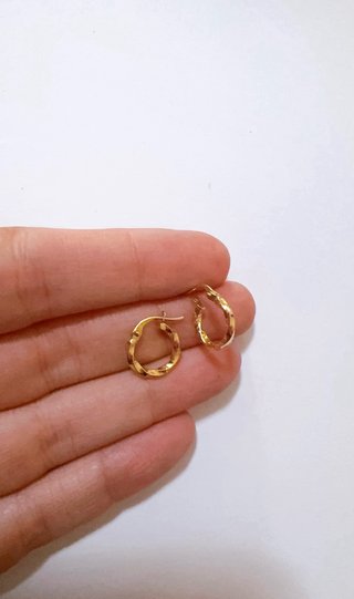 Orecchini a cerchio intrecciati in oro 18kt 750