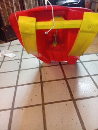 Trineo infantil rojo con volante