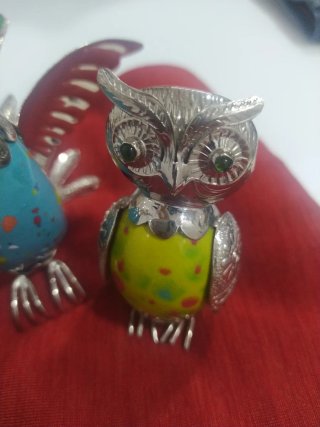 Figuras metal plateado y cerámica