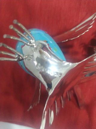 Figuras metal plateado y cerámica