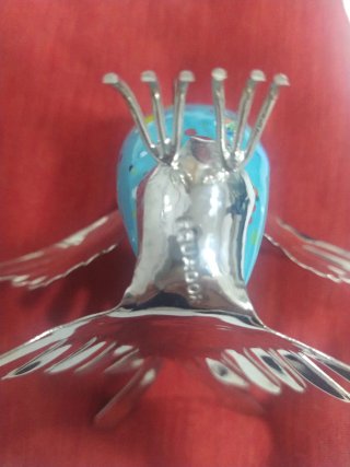 Figuras metal plateado y cerámica