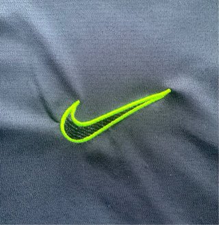 Pantalón corto Nike azul y lima
