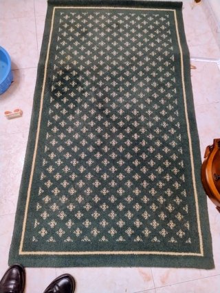 Alfombra de pasillo en tonos verdes