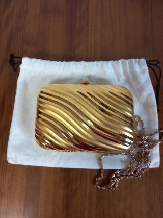 Bolso de fiesta metálico dorado MENBUR