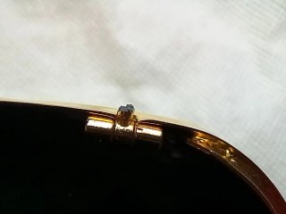 Bolso de fiesta metálico dorado MENBUR