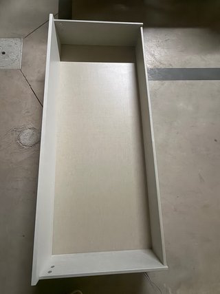 Cuna convertible color madera y blanco
