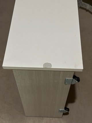 Cuna convertible color madera y blanco