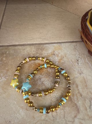 Conjunto 2 Pulseras Estrellas Azul y Dorado