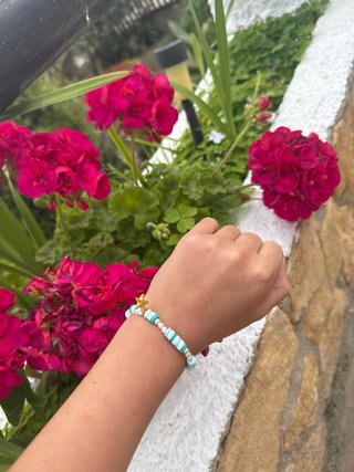 Pulsera perlas y estrella dorada