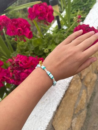 Pulsera perlas y estrella dorada