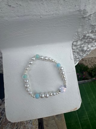 Pulsera perlas y estrella transparente