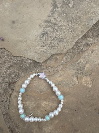 Pulsera perlas y estrella transparente