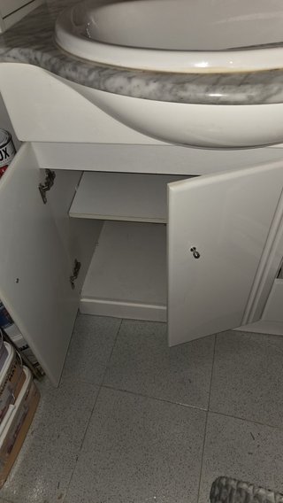 Mueble de baño con lavabo y mármol