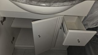 Mueble de baño con lavabo y mármol