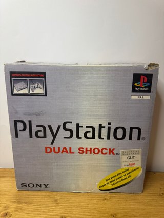 PlayStation 1 con scatola inserti e manuali