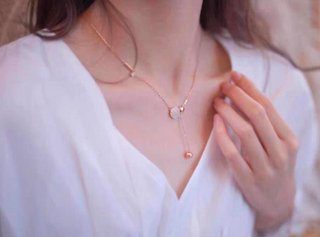Colgante oro y plata
