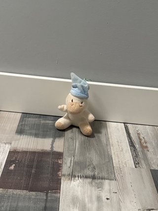 Peluche animal con gorro de dormir