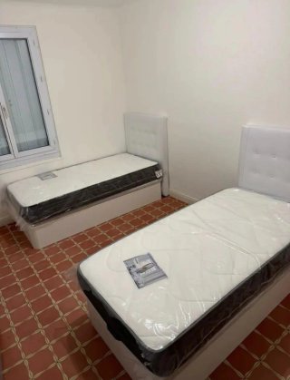 2 Camas individuales con colchón