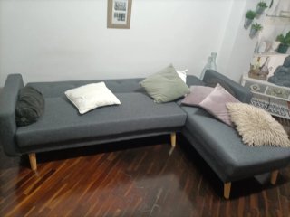 Divano letto angolare grigio