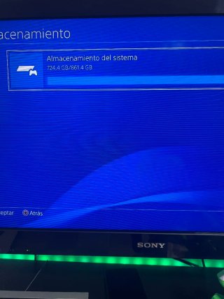 Consola PS4 con 2 mandos (negro y dorado)