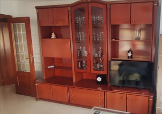 Mueble de salón madera y cristal