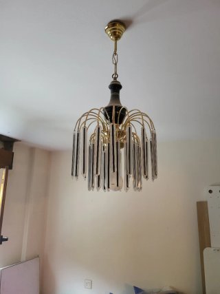 Lámpara colgante dorada y transparente