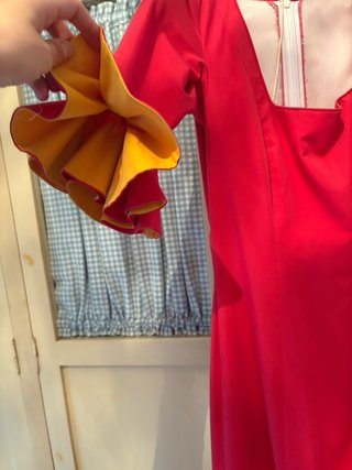 Vestido de flamenca rosa fucsia y albero con volan