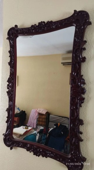 Espejo de madera tallada