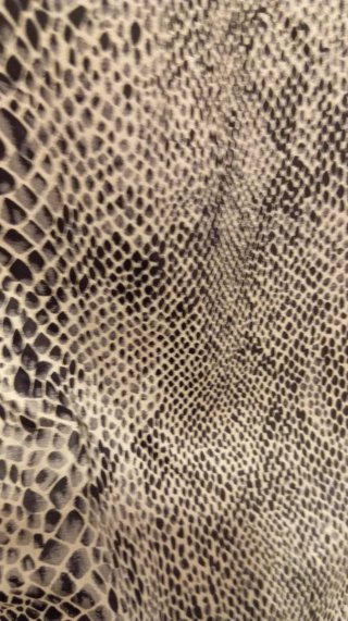 Falda serpiente talla 46 adaptable