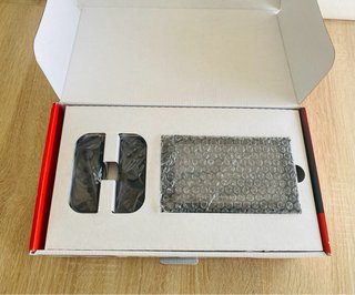 Nintendo Switch Negra y Gris completa