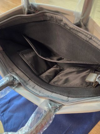 Bolso de mano Taikesen gris. Nuevo.
