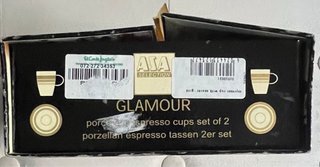 Juego 2 tazas de porcelana negras y doradas