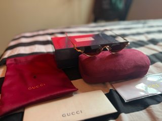 Gafas de sol Gucci doradas y marrones