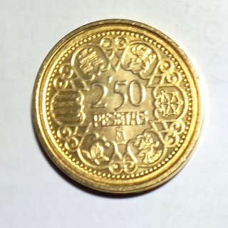 Réplica moneda Franco, baño oro.sin abrir