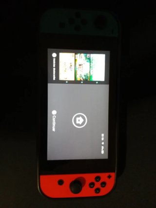 Nintendo Switch Azul y Rojo con accesorio