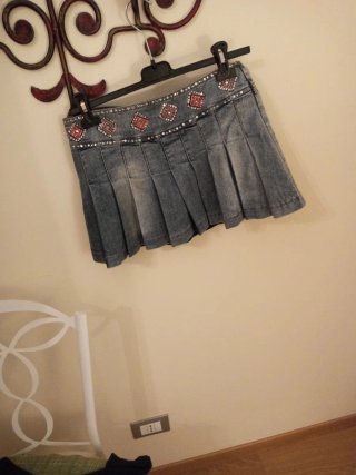 Minigonna jeans a pieghe taglia M