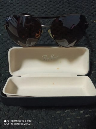 Gafas de sol Ray-Ban y cargador dsi