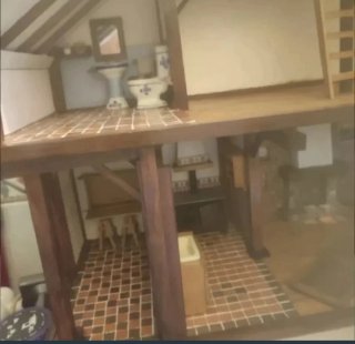 Casa de muñecas rústica de madera