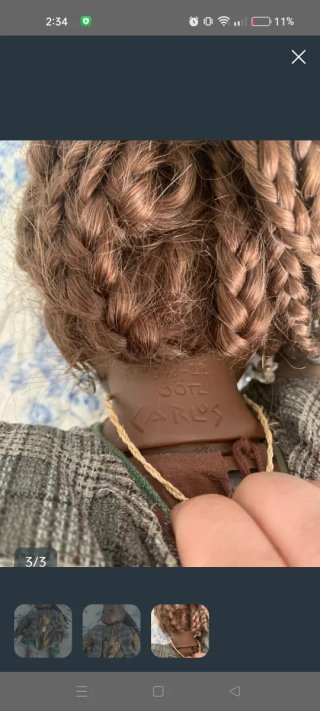 Muñeca de trapo con vestido étnico