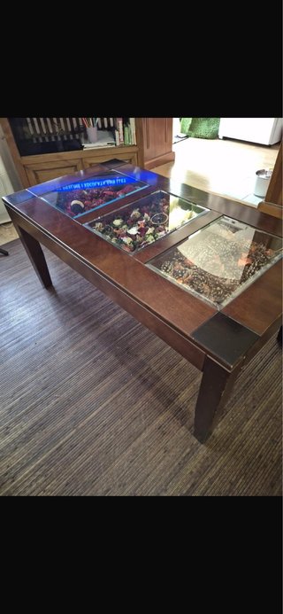 Mesa de centro de madera y cristal