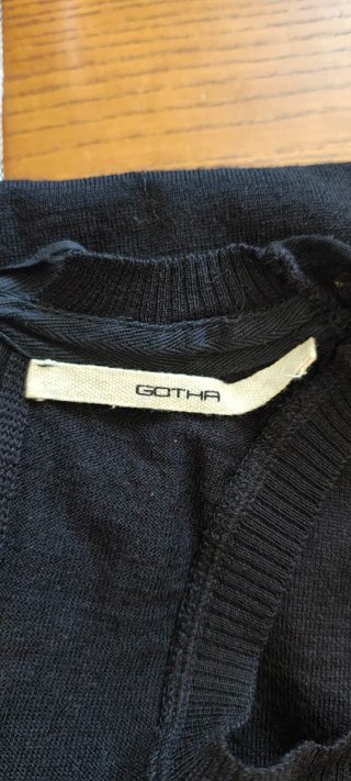 Top Gotha paillettes oro e nero