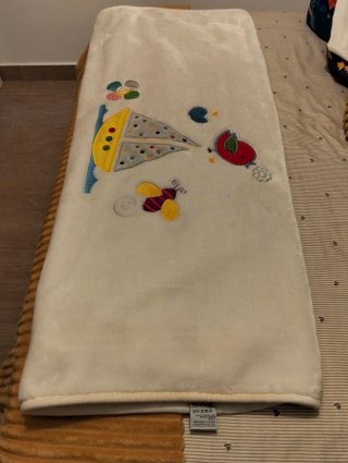 Manta de cuna con barco y pájaro