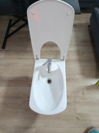 Bidé blanco con grifo Roca
