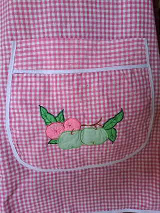 Vestaglietta a quadretti rosa con tasca