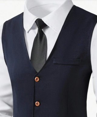 Traje azul chaleco y pantalón niño T.14 años